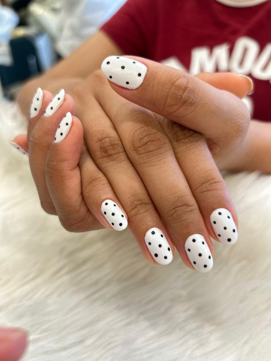White polka dot nail art manicure